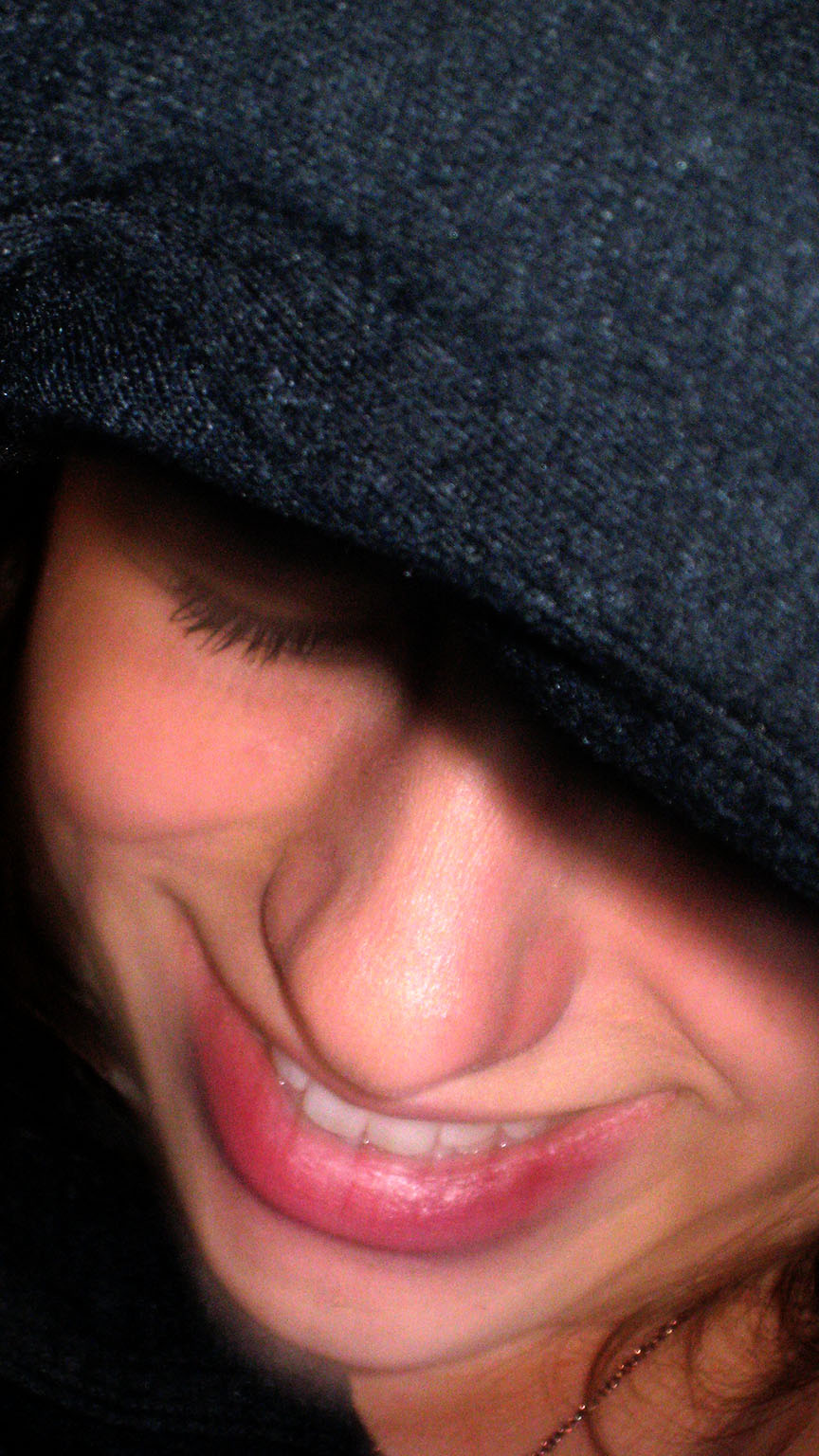 A girl wearing a gray hat in color